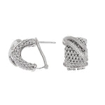 Ribbons of white gold which are pave-set, glorious luxury limited edition earrings!